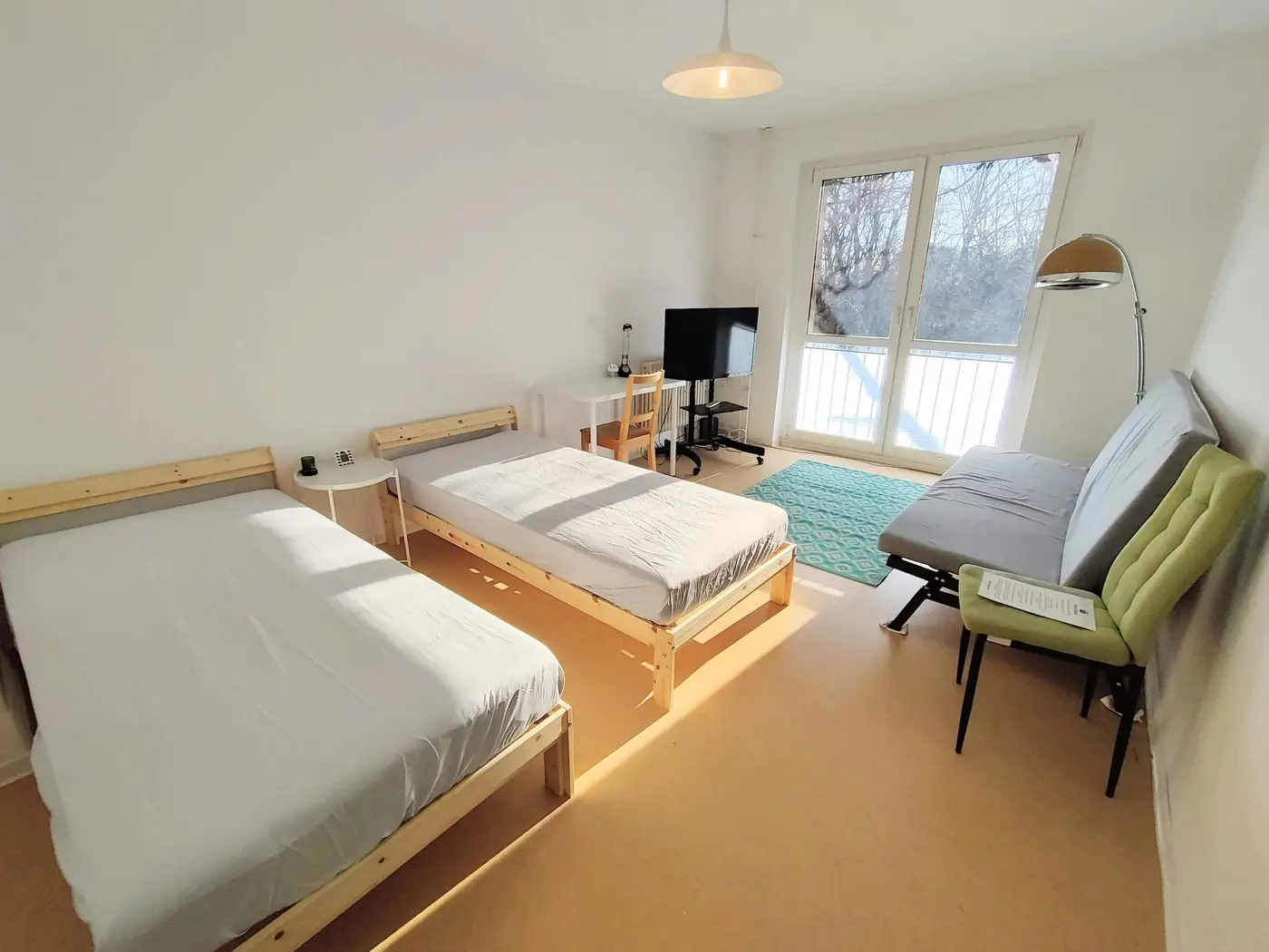 Zimmer mit Einzelbetten in der Wohnung an der Storkower Straße